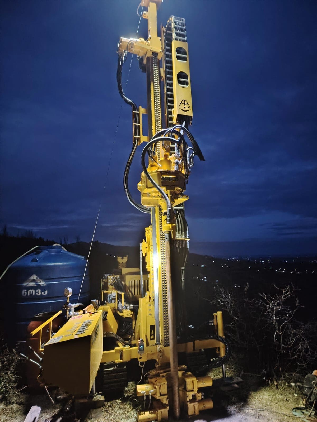 Beretta T44 borehole drilling rig operating at night for geotechnical investigation in Kutaisi, Georgia