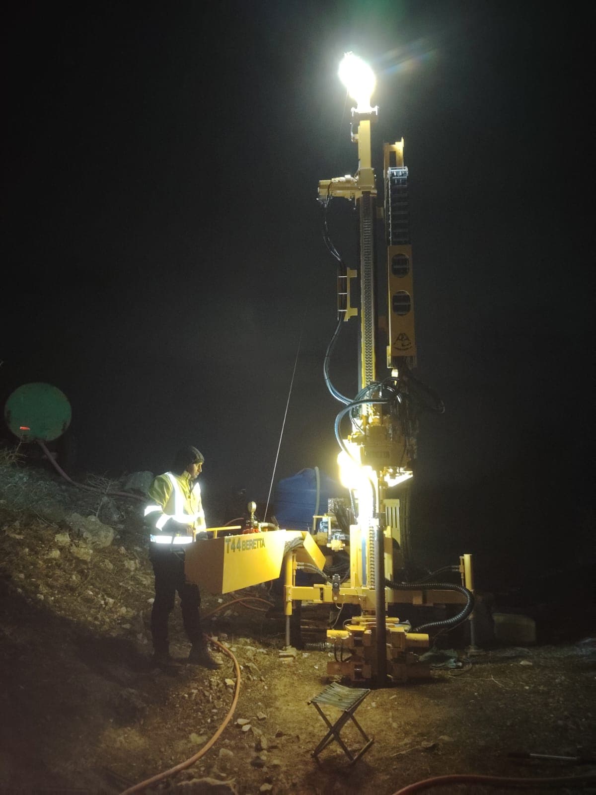 GGG geologist engineer operating Beretta T44 drilling rig during night shift in Kutaisi region